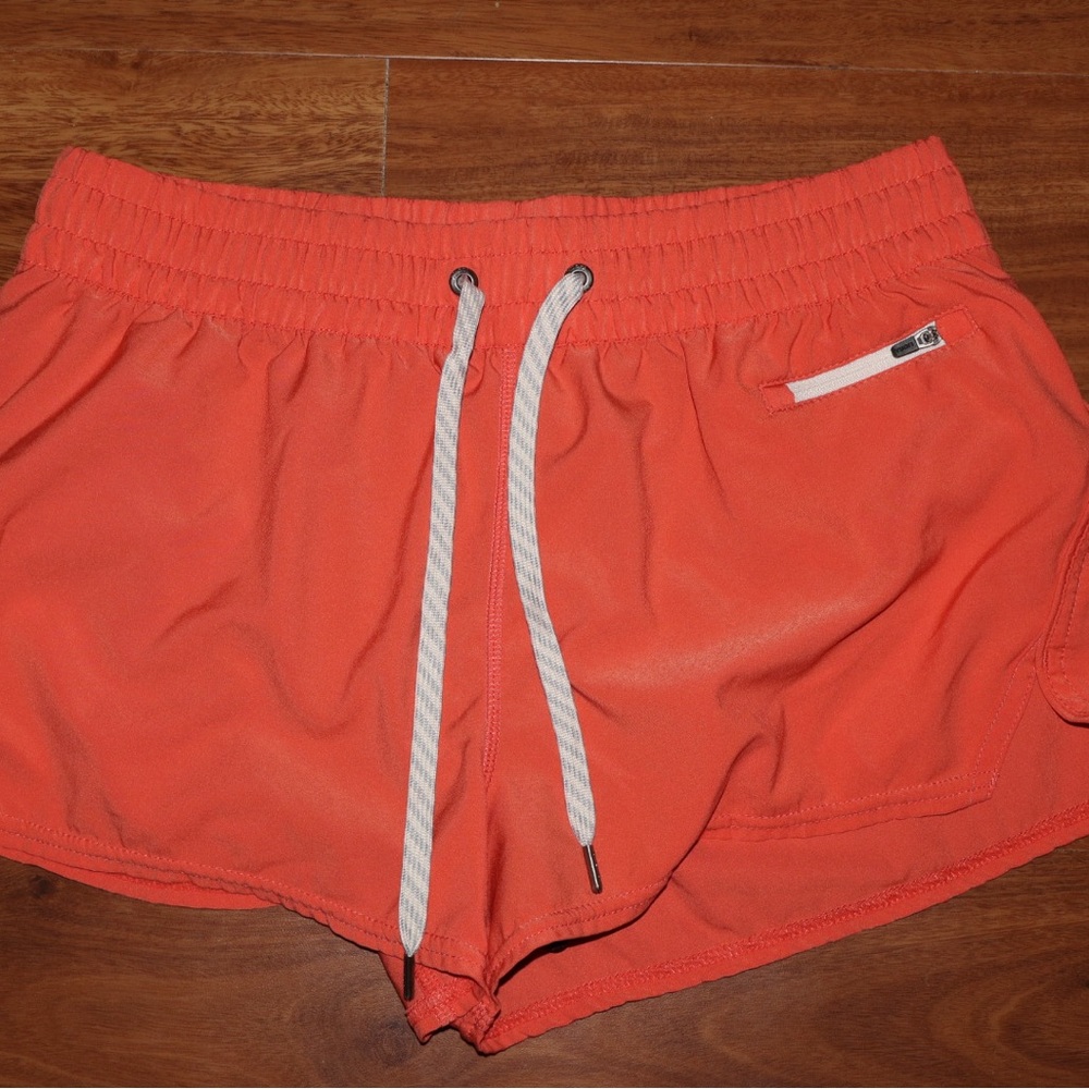Vuori Women's Bright Orange Athletic Shorts